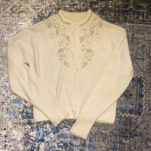 Vintage, cream colored, very soft, beautifully detailed sweater -pearl buttons
